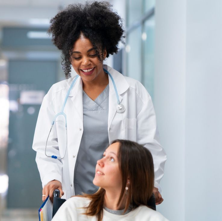 front-view-smiley-female-doctor-patient